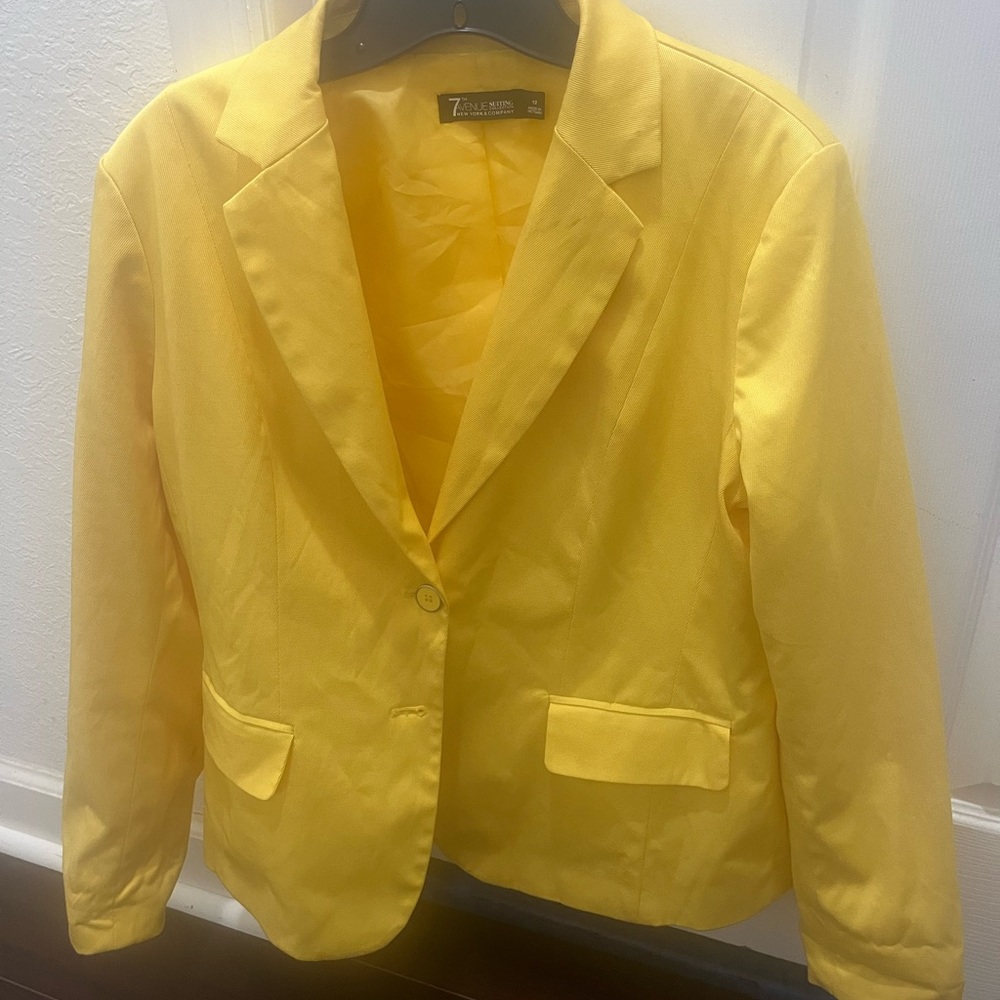 Lightly worn, dry cleaned condition.